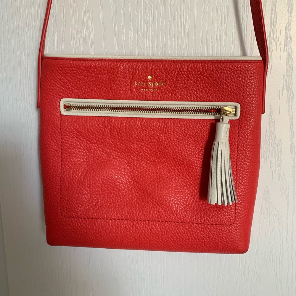 Kate spade cross body coral with white tassel